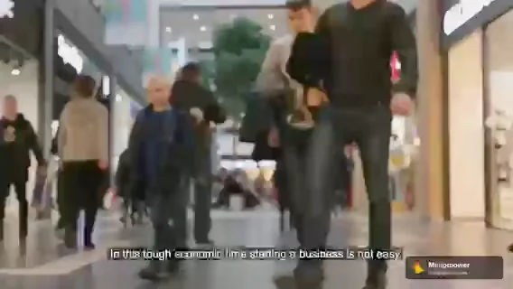 Watermarked preview frame of a corporate business-and-market film