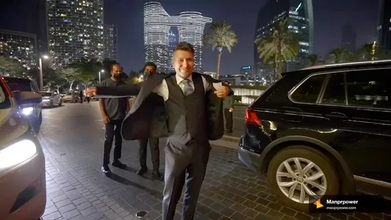Production showcase frame of guests arriving at an evening event